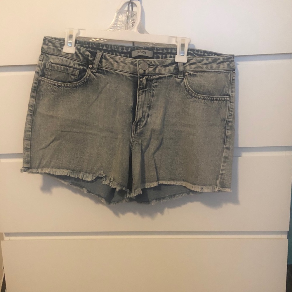Acid washed shorts . Frayed at the ends